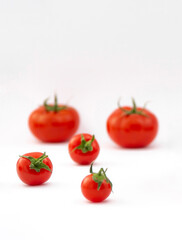 Tomatoes on white background. Isolated tomatoes on white background.