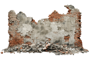Damaged brick wall with crumbling plaster and debris in a construction site setting captured during daylight