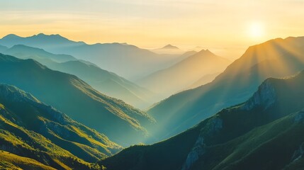Fototapeta premium The sharp contrast of light and shadow on a mountain range at dawn, where the rising sun creates deep shadows in the valleys.