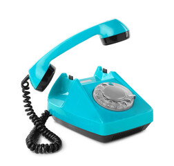 Old light blue telephone with rotary dial isolated on white