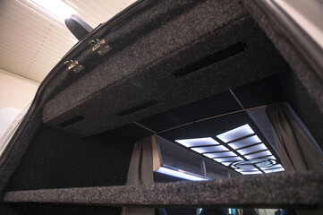Comfortable interior of a passenger bus with soft seats. The design is made to order. Private...
