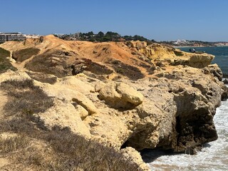 Algarve, Sea, Waves, picturesque formations of yellow and reddish-brown limestone and sandstone cliffs and small bays