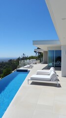 Fototapeta premium Modern infinity pool with lounge chairs overlooking valley.