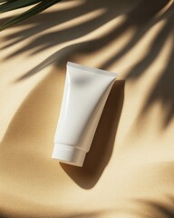 White cosmetic tube on beige background with shadow, minimalistic design, perfect for skincare product advertisements and branding.