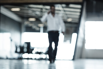 Phone call, walking and man in blurred office with mobile networking, communication and connection. Smartphone, talking and businessman in conference room planning schedule, agenda or conversation