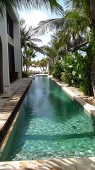 Tranquil Pool Oasis with Palm Trees and Modern Architecture.