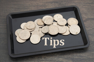 Your tip with a tray and money