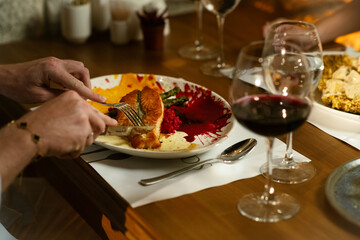 Man Savors His Fish Dish at Dinner