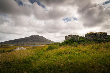 A summer HDR image of Eaval, Eabhal, across loch nighe near the end of road sculpture "Sanctuary", North Uist, Outer Hebrides, Scotland. © espy3008