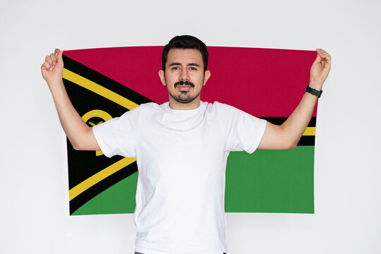 Moustached man holding Vanuatu flag, campaigning concept, patriot and nationalist person