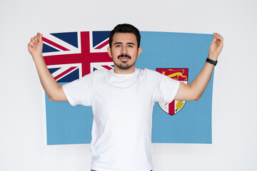 Moustached man holding Fiji flag, independence or celebration day idea, patriot and nationalist 