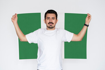 Moustached man holding Nigeria flag, independence or celebration day idea, patriot and nationalist 