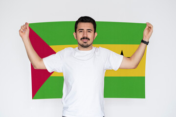 Moustached man holding Sao Tome And Principe flag, protest or social issues in Sao Tome And 