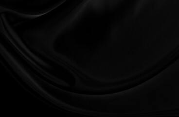 Black gray satin dark fabric texture luxurious shiny that is abstract silk cloth background with patterns soft waves blur beautiful.