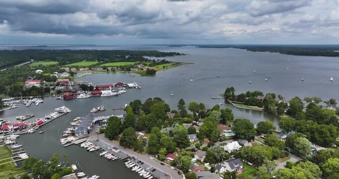 Late summer, early fall aerial, drone, video of the St Michaels Maryland skyline and the Chesapeake Bay.  September 2024.