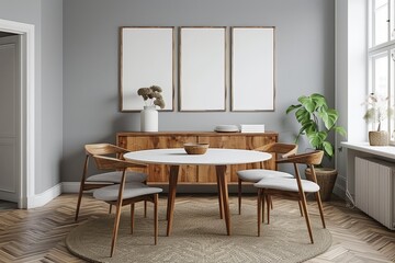 Scandinavian style dining room with grey walls, wall art frames, Scandinavian furniture, wooden sideboard, round white table, and chairs. Minimalistic design with natural lighting.
