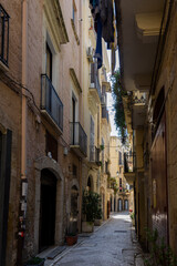 Charming narrow street in the old town of Bari, Puglia, Italy