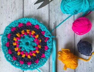Crochet mandala doily multicolor process handmade decor interior and clews of wool bright creative...