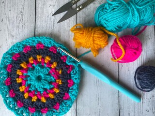 Crochet mandala doily multicolor process handmade decor interior and clews of wool bright creative...