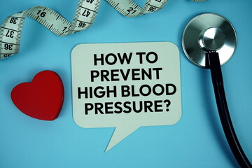 How To Prevent High Blood Pressure? text on speech bubble with Red heart , measure tape and...