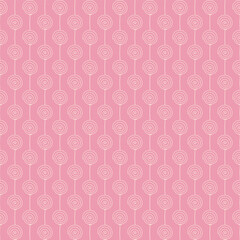 A repeating pattern of spirals on a pink background, suitable for wallpapers or fabric designs.
