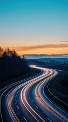 A Serene Highway at Dawn: Streaks of Light Paint the Asphalt Canvas as the First Rays of Sun Gild the Sky.