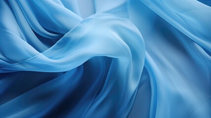 Fototapeta premium A soft, flowing blue fabric creates a beautiful abstract background.