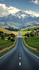 Naklejka premium A Winding Road Beckons, Leading to Majestic Snow-Capped Peaks Under a Serene Sky.