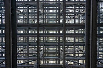 ASRS clad rack structural framework close up photograph frog perspective symmetry