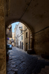 Naklejka premium Charming narrow street in the old town of Bari, Puglia, Italy