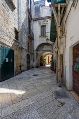 Obraz premium Charming narrow street in the old town of Bari, Puglia, Italy
