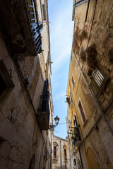 Charming narrow street in the old town of Bari, Puglia, Italy