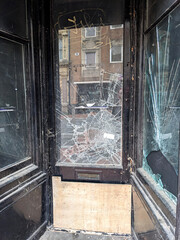 Smashed Door Window on a Shop Vandalism Raid
