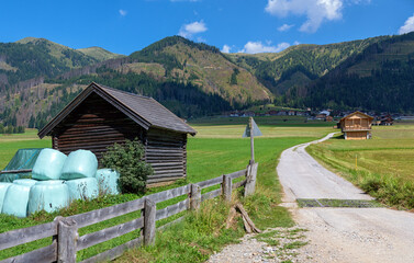 Rural landscape with road near Obertilliach in the Lesachvalley in East Tyrol, Austria