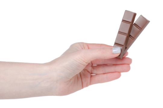 Chocolate bars sticks in hand isolation