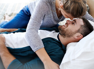 Obraz premium Happy couple, bedroom and intimacy to relax with support, romance and partnership for love. People, embrace and trust in commitment to relationship in home, bonding and comfortable together in bed
