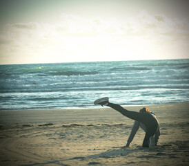fit sportive woman on a beach
