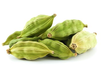 A stack of fresh green vegetables arranged on a clean white surface, ready for use in cooking or photography