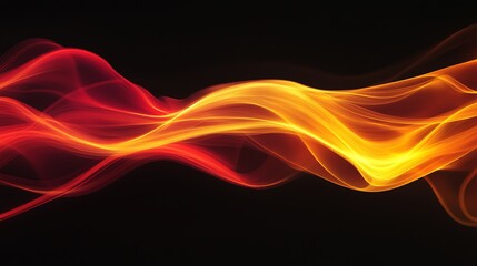 Fototapeta premium Vibrant swirl of red and yellow light creating an ethereal effect against a dark background, perfect for dynamic visual designs.