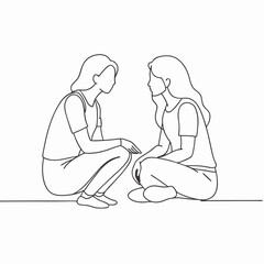 Two young women engaged in a close conversation while sitting on the floor with a minimalistic background copy space
