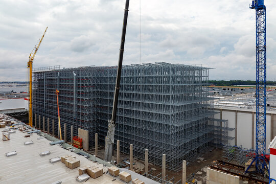 Aerial drone photograph of ASRS clad rack structural framework of warehouse building skeleton during construction works