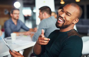 Smile, portrait and man in meeting pointing at you with tablet, opportunity and workshop in office. Happy, face and creative businessman in conference room for fun collaboration at digital agency