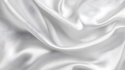 Fototapeta premium Abstract white silk background with wavy folds of fabric, elegant wallpaper for design or presentation