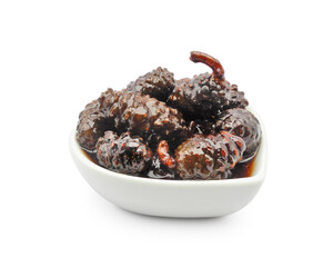 Pine cone jam in ceramic bowl isolated on white background. Natural product for health and immunity.