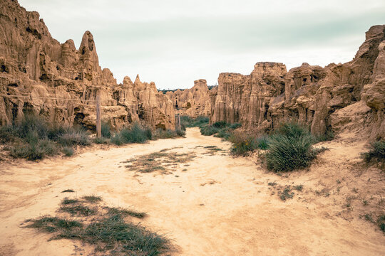 a dirt path across the natural sculptures of Aguarales de Valdemilaz, Valpalmas, comarca of Cinco Villas, province of Zaragoza, Aragon, Spain