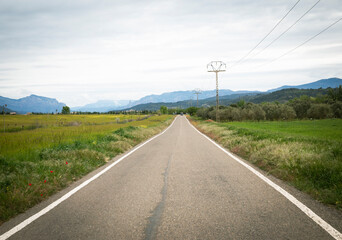 Fototapeta premium A-125 paved road near Ardisa, comarca of Cinco Villas, province of Zaragoza, Aragon, Spain