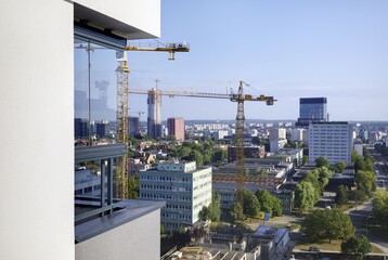 Budowa nowoczesnych  apartamentowców w centrum miasta, plac budowy. © arteffect.pl