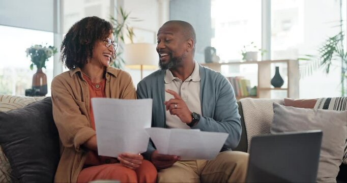 Happy couple, paper and laptop in home for budget, finance planning or bank statement on sofa. Man, woman or talking in living room with documents, insurance comparison or excited for savings balance