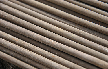 welding electrodes in the background. laid out welding electrodes close-up