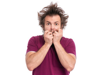 A frightened man with wild, messy hair, holding his hands near his face in a nervous gesture. Isolated on a white background.